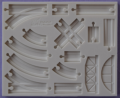  Foto: Alphabet moulds - binari del treno am0255